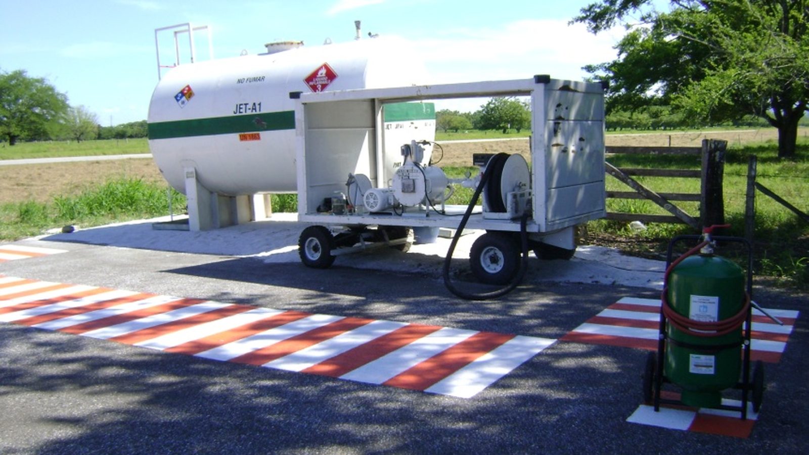 Aerofull fuel truck servicing an aircraft at a fixed fueling point